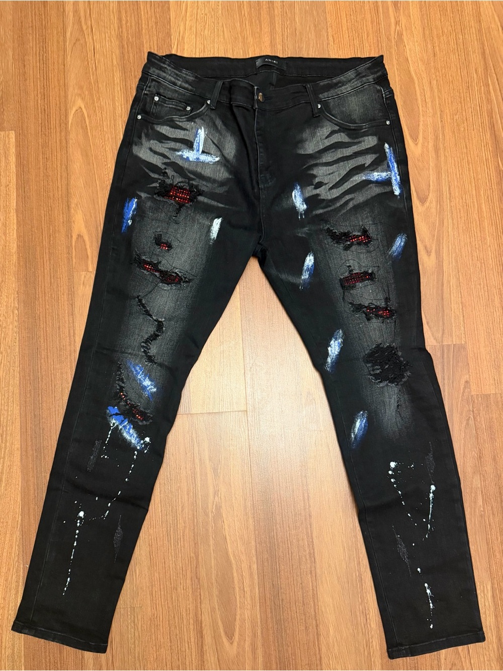 AMIRI Black Skinny Jeans with Blue and Red Accents